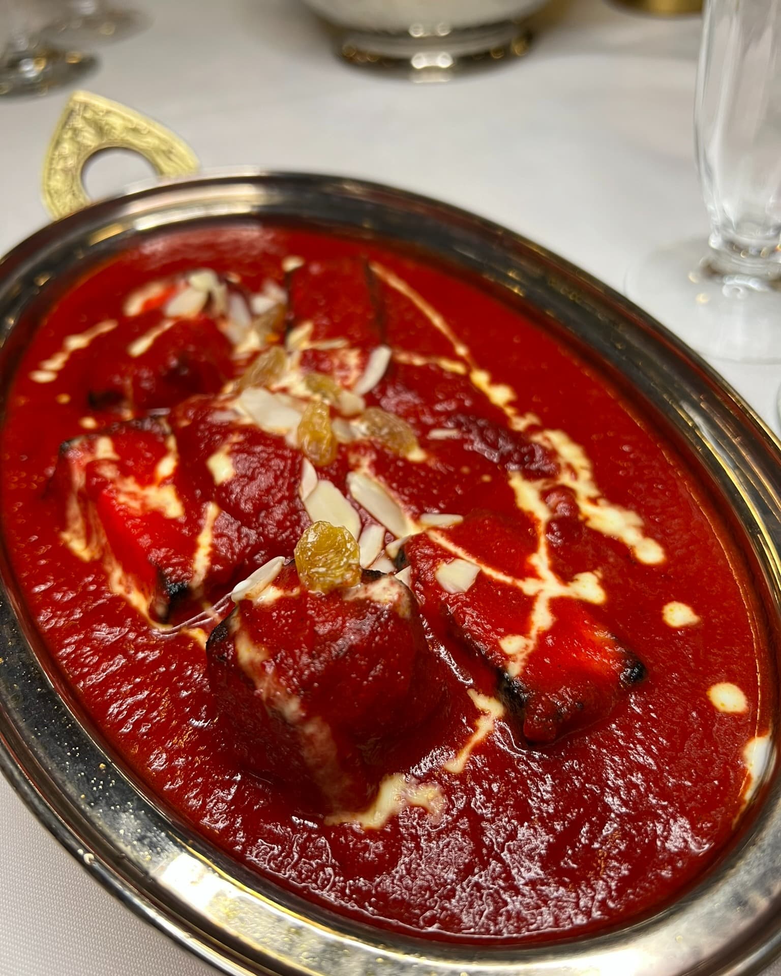 Butter chicken with cream and almond flakes