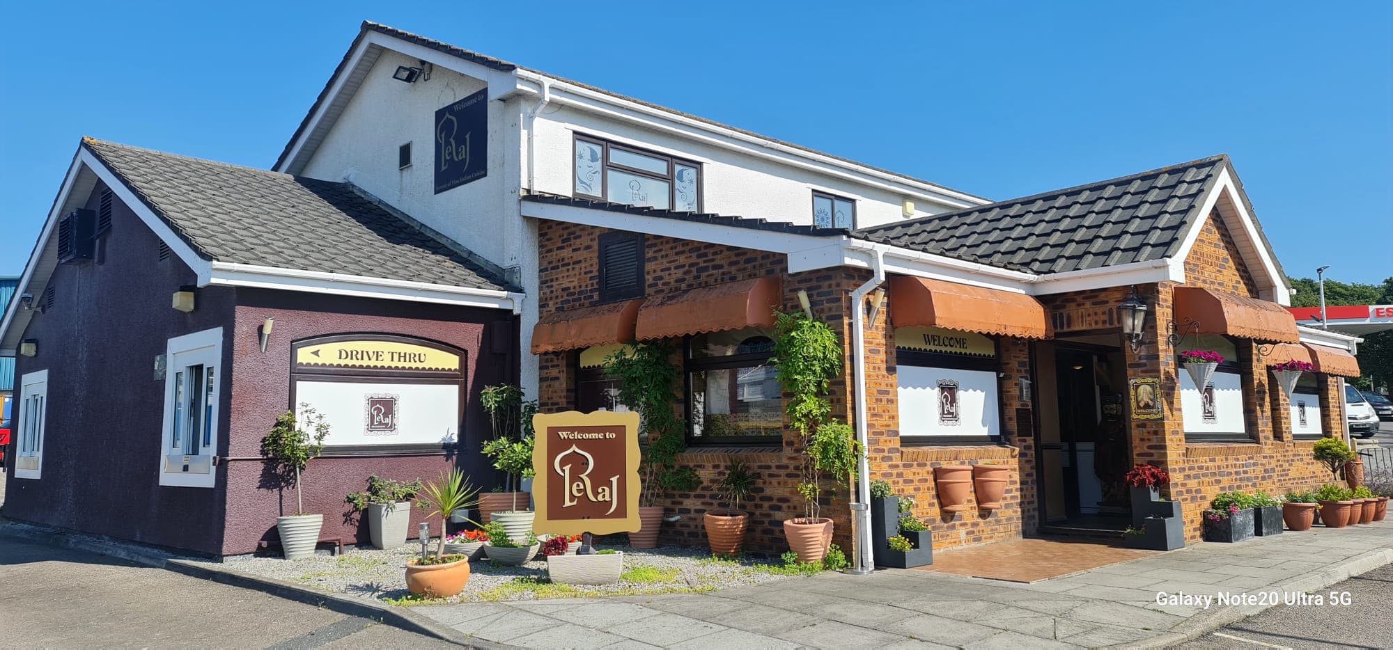 Leraj front entrance with Welcome sign